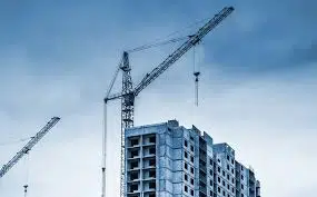 Construction site crane over building